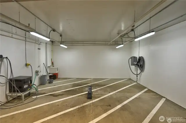 Convenient utility bay for washing and vacuuming your car.