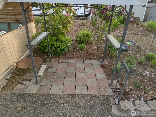 Covered patio area for a BBQ maybe?