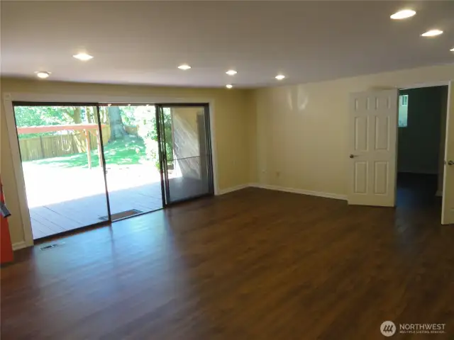 Family room with slider to deck and back yard