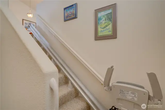 Stairway to the upper level complete with stair lift system.