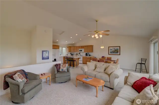 Living room, dining room and kitchen. This condo is fully furnished and move in ready.