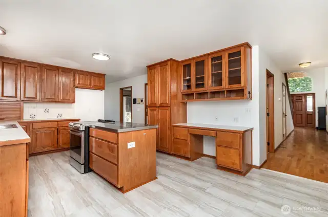 Kitchen includes stainless steel island & walk-in pantry