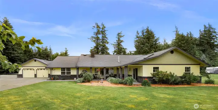 Single-level living with NO steps for entry. Two car attached garage with shop space. Several French drains around property to divert water. Thick attic insulation blankets and solar fans to air out attic space.