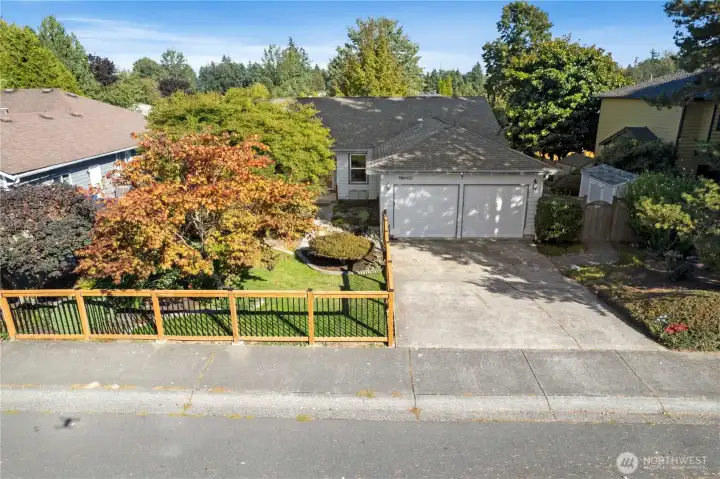 Welcome home!  Attached 2 car garage, gorgeous new fence, mature professional landscaping.