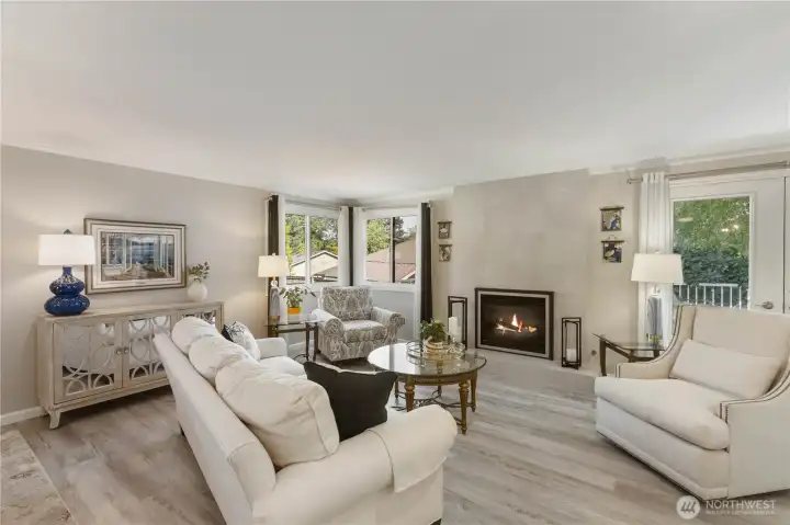 The adjoining family room is perfect for that cozy evening in front of the fire or quiet conversation