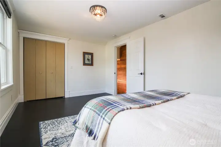 Primary bedroom is east-facing and has lots of morning light.