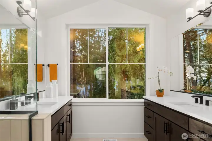 Primary bathroom features 3cm slab quartz countertops