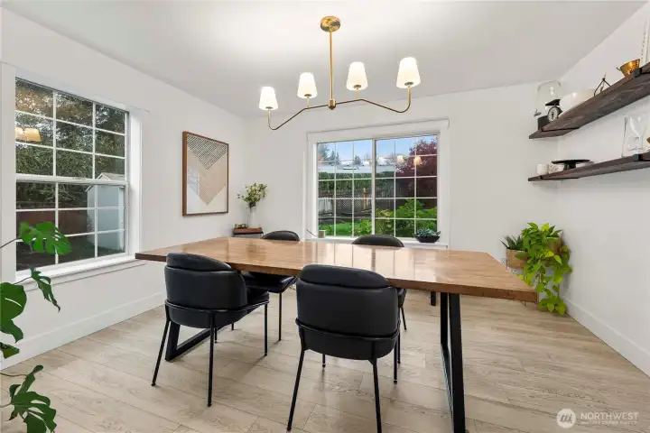 Dining room with more large windows to let in the light
