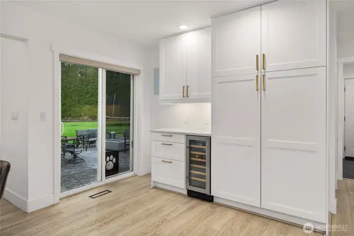 built in pantry, wine/beverage fridge and storage space