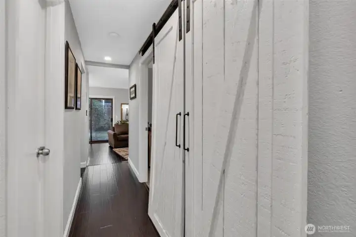 Light and bright front hallway leads to living area.