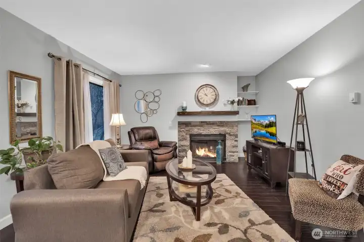 A cozy living space with a warm fireplace to gather around.