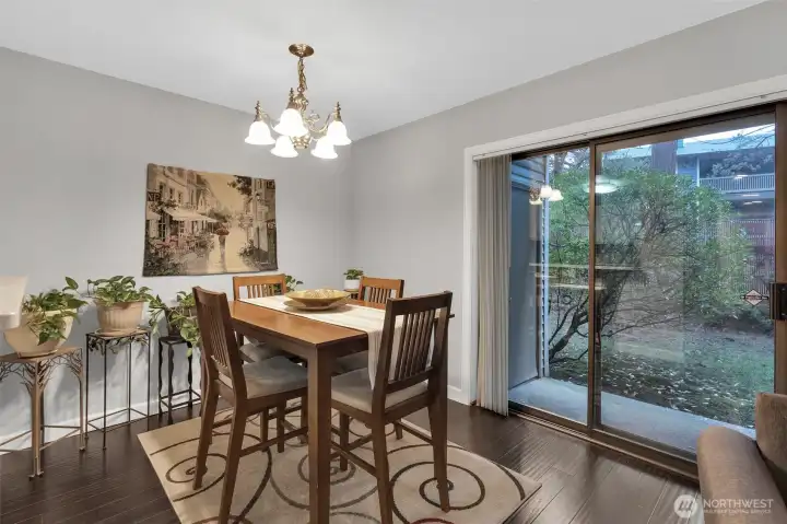 The dining area allows for a suitable table and chairs for your everyday meals. A sliding door provides easy access to the outdoors and gives a more open and airier feel to the space.