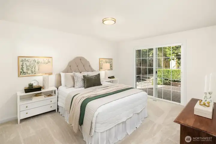 Nice sized primary suite, with sliding doors to patio giving easy access to the hot tub. Brand new ensuite three-quarter bath not shown.