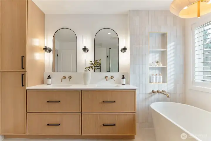 Mirrors open to reveal cabinets