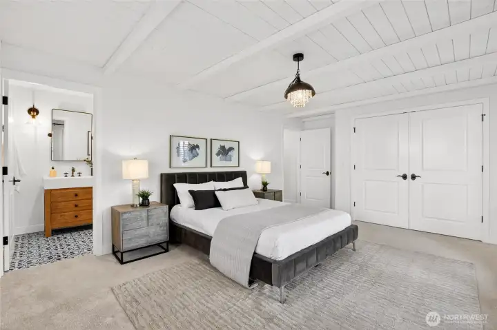 Secondary bedroom has ensuite full bathroom with shower and tub.