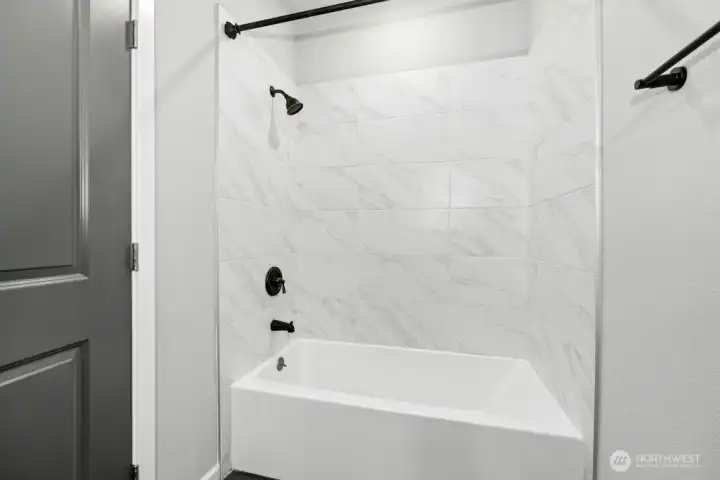 Bath tub in second primary bathroom.