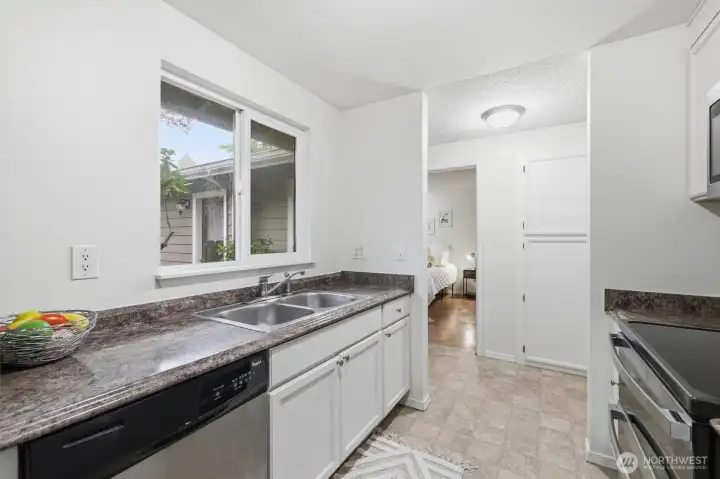 Enjoy a large window overlooking a garden space.