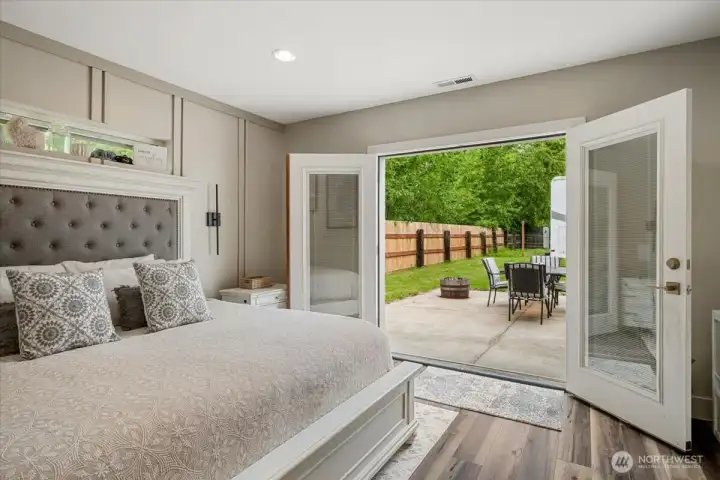Inviting primary bedroom with private patio access