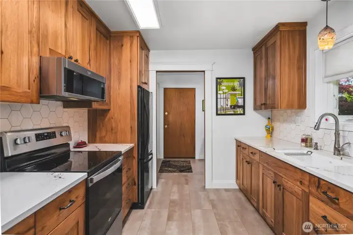 Kitchen Conveniently Located near Laundry & Garage