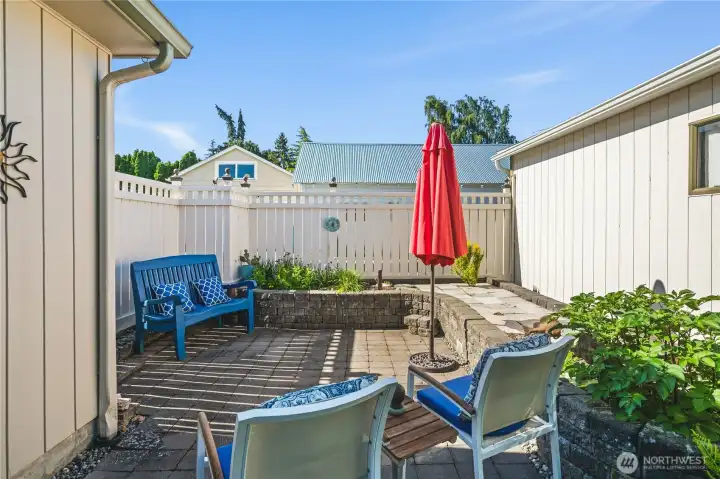 Sunny warm private patio with room for garden inside the fence (blueberries & herbs love it!) and the best tomatoes just outside the fence!