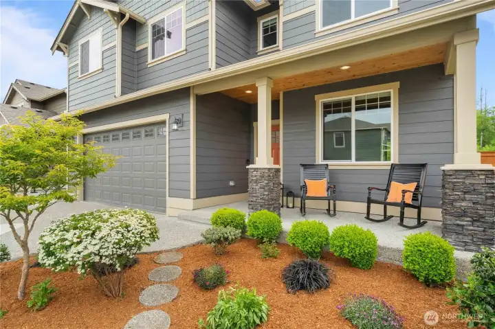 Beautifully landscaped Stanwood WA home with covered patio and outdoor entertaining space Beautifully landscaped Stanwood WA home with covered patio and outdoor entertaining space