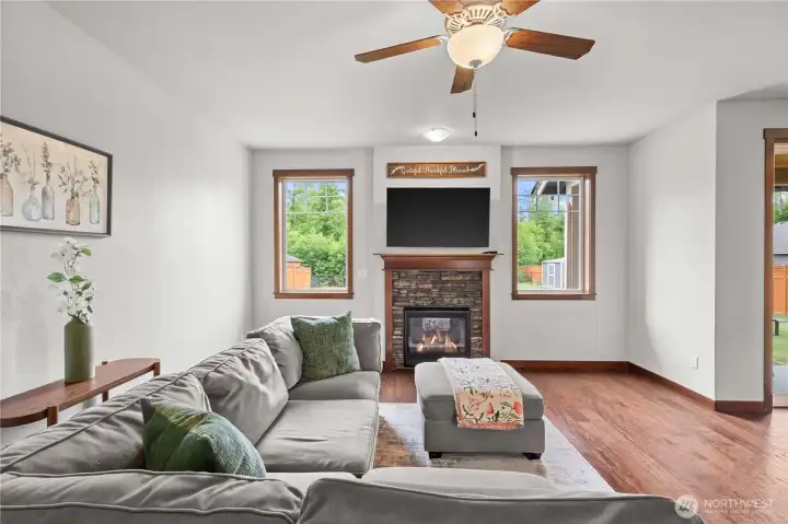 Spacious family room with fireplace in move-in ready Stanwood WA home near nature trails Spacious family room with fireplace in move-in ready Stanwood WA home near nature trails