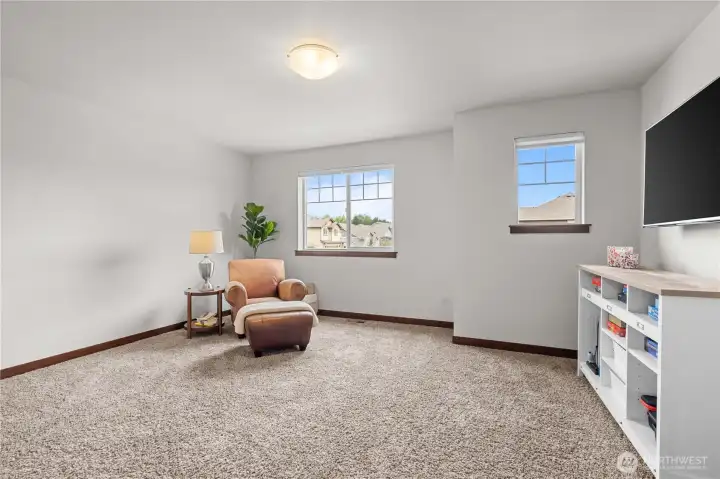Large upstairs bonus room perfect for movie nights, gaming, homeschooling, or guests Large upstairs bonus room perfect for movie nights, gaming, homeschooling, or guests