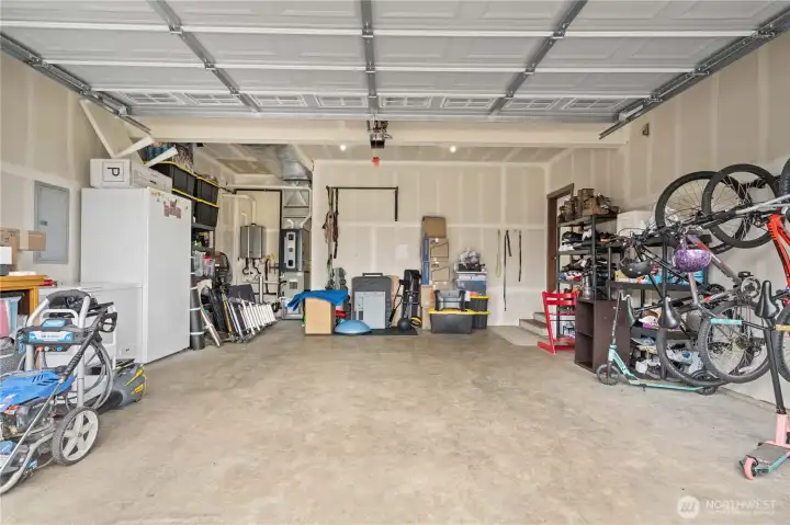 Attached 2-car garage with storage space in move-in ready Stanwood WA home built in 2020 Attached 2-car garage with storage space in move-in ready Stanwood WA home built in 2020
