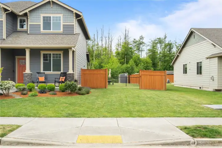 Modern two-story home in Stanwood WA with landscaped yard, large lot, and covered front porch Modern two-story home in Stanwood WA with landscaped yard, large lot, and covered front porch