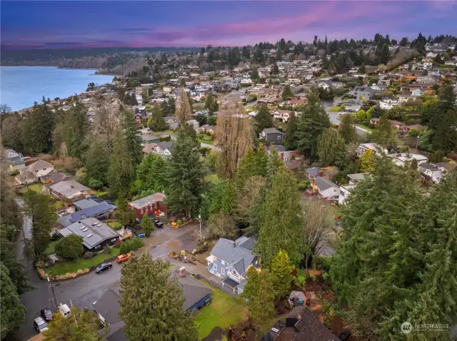 House is walking distance to the private North Beach Club entrance. ($120 per year membership fee) Water views from upper floor.