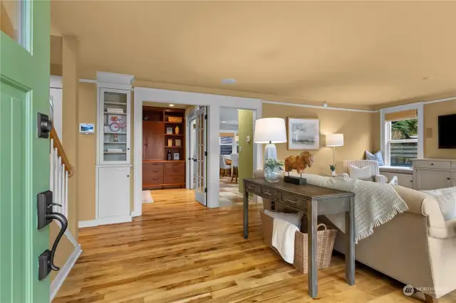 Solid Oregon Myrtle wood floors and built in cabinetry in the entry room.