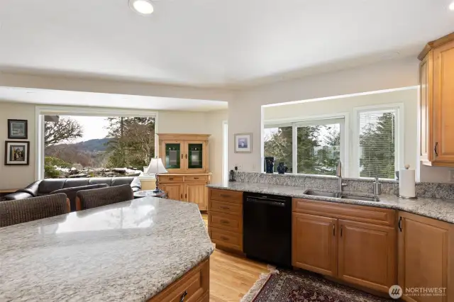 Kitchen with granite countertops and under cabinate lighting