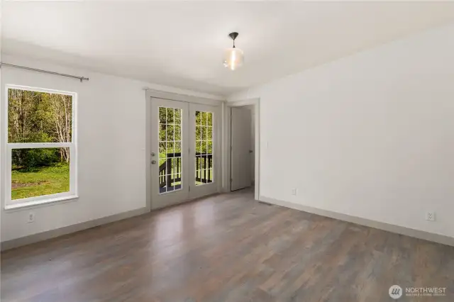 Master bedroom with slider to an outside deck