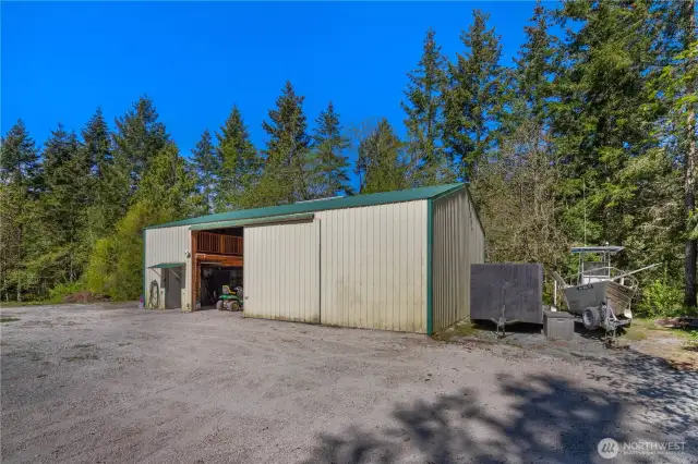 Shop with 11' high sliding door  and 1/2 bath with shop sink