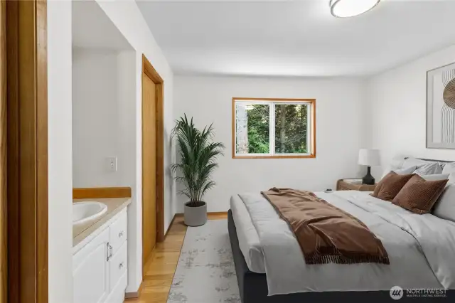 Bedroom #2 with private sink & cabinet. Virtually staged