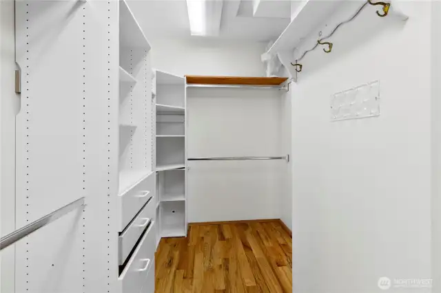 Spacious walk-through closet. Primary suite.