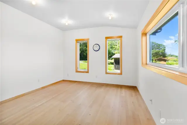 Versatile studio/office space above detached shop. Virtually staged