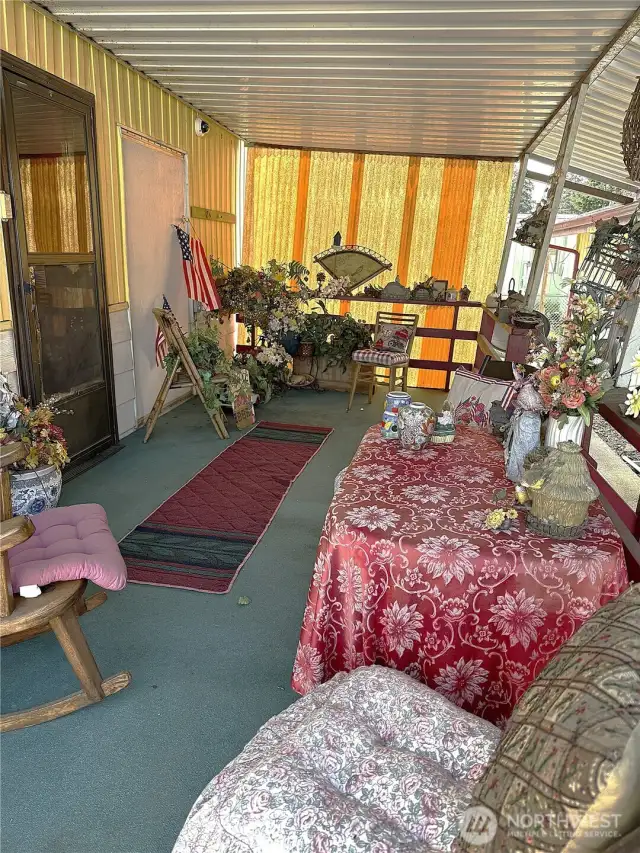 Covered back porch leading to your huge 3 car garage and or workshop