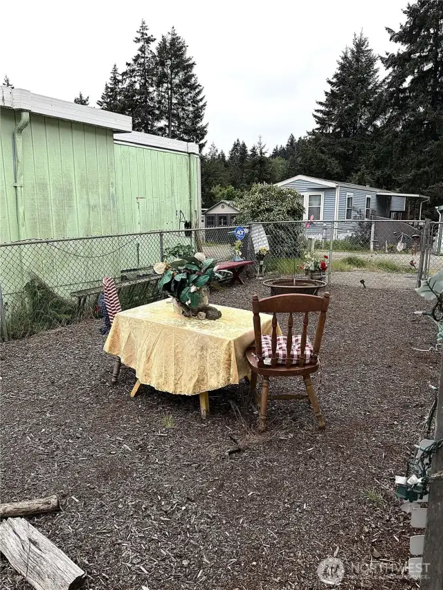 Another sitting area for you or turn into a playground or even a garden area