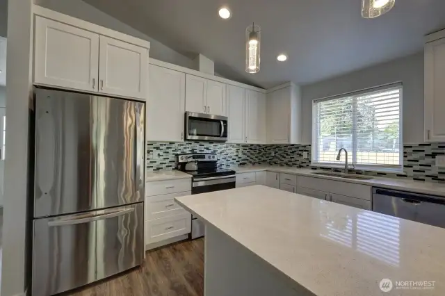 Stainless appliances and corian countertops
