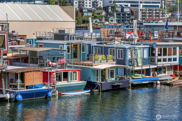 You can tie up a canoe/kayak like you see the other houseboats have done.  15% overhang is the general rule.