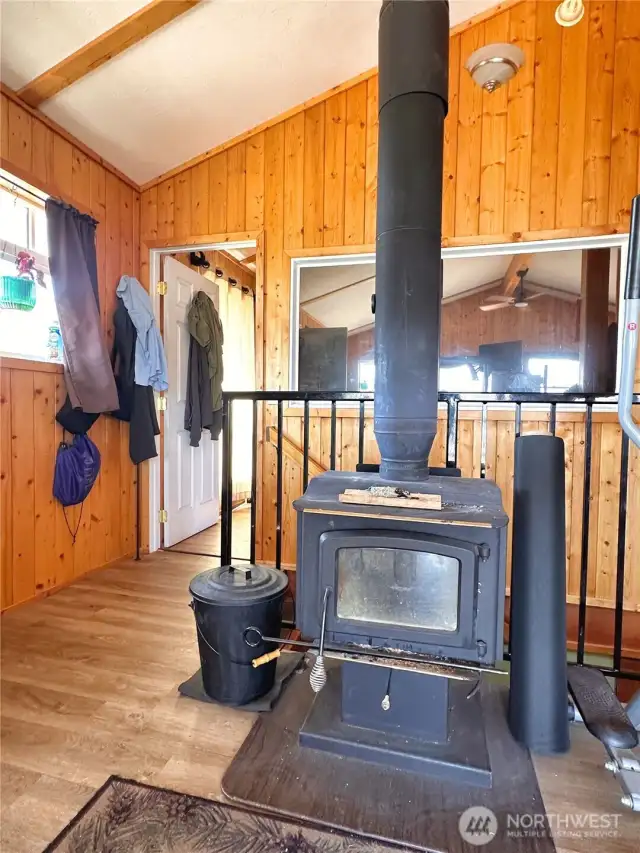 Cozy wood burning stove in living room is perfect for the winter season