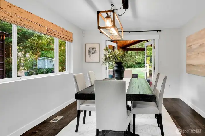 What? More French doors? These double doors lead to a spacious covered porch.