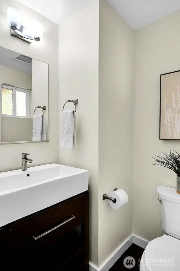 Updated half bath on the main floor.