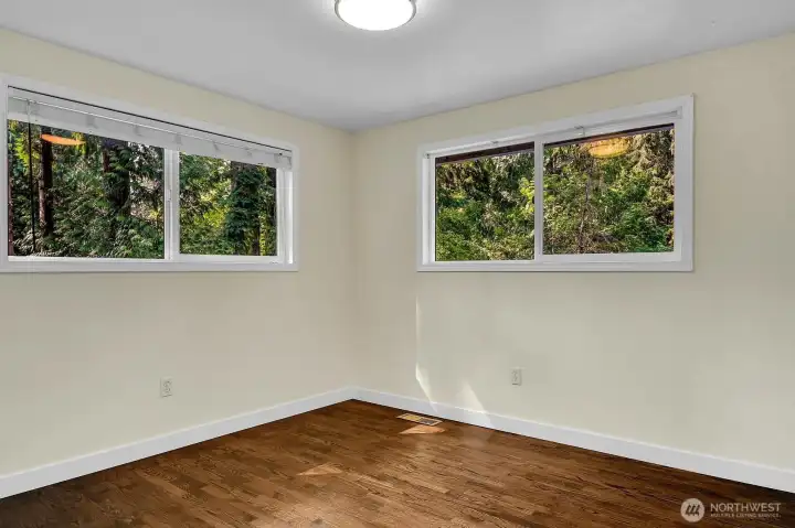 Bedroom #4 offers lots of natural light with windows to the south and the west.