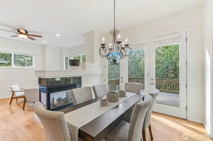 Dining area with glass doors out to the deck.