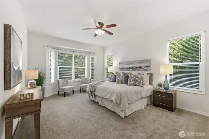 The primary bedroom easily accommodates a king sized bed.