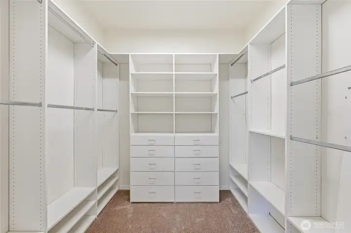 Customized primary closet.