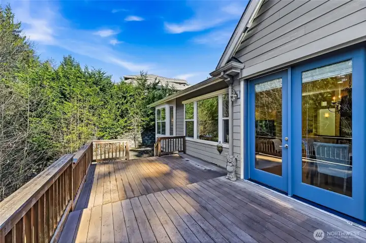 The oversized deck runs almost the length of the home.
