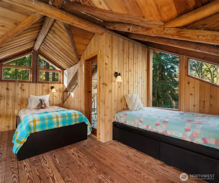 Fun loft area wih balcony.